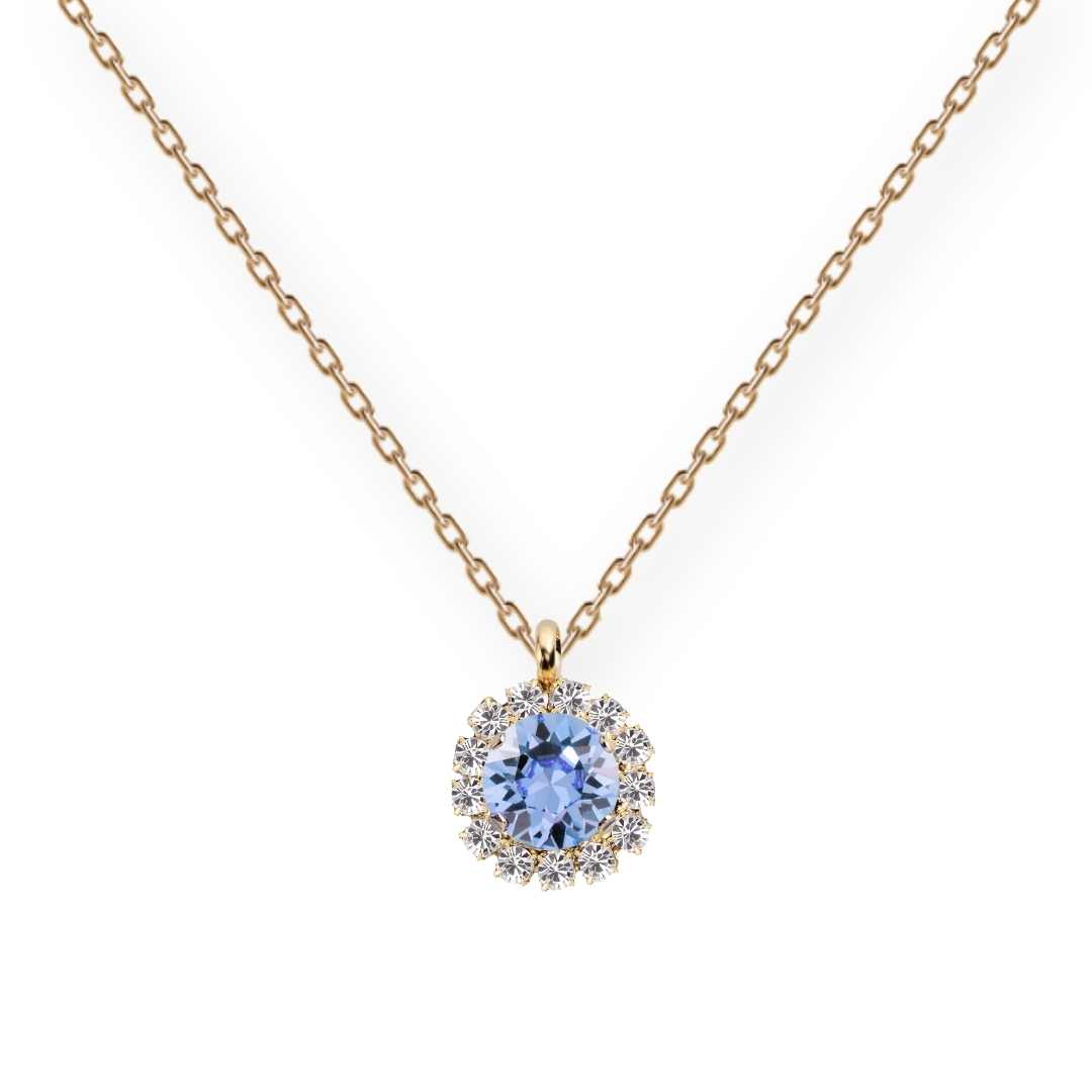 Grezna zelta antialerģiska kaklarota ar gaiši zilganu kristālu ķēdītē