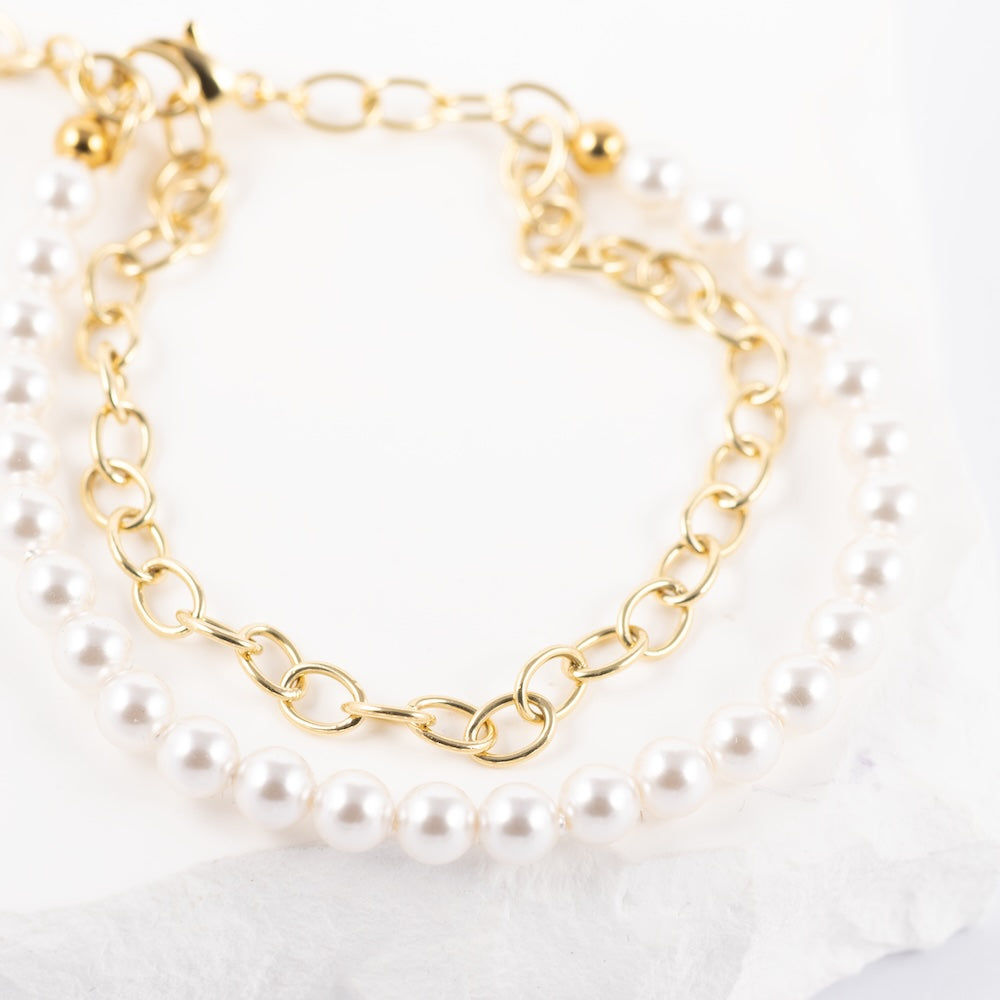 ķēdīte ar pērlēm un kristāliem