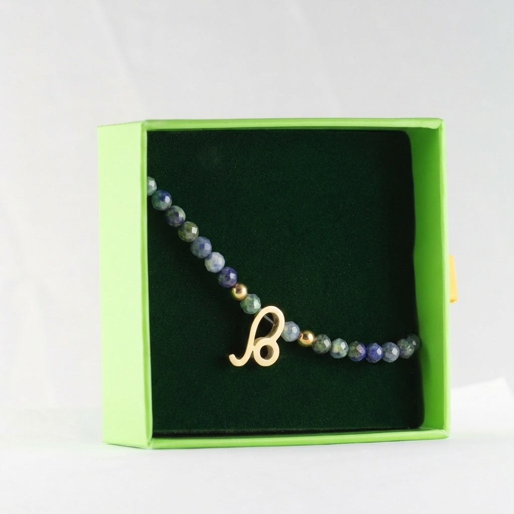 Sodalīta akmens rokassprādze ar horoskopa zīmes kulonu