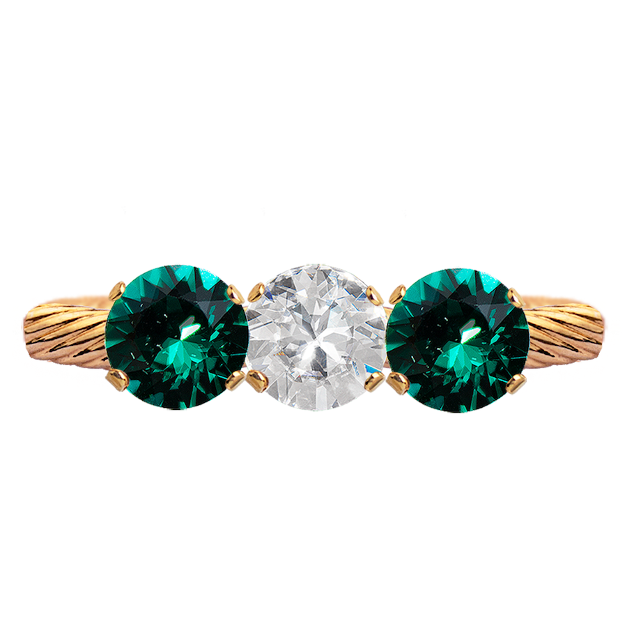Apzeltīti pīts gredzens ar caurspīdīgu un emeralda kristāliem